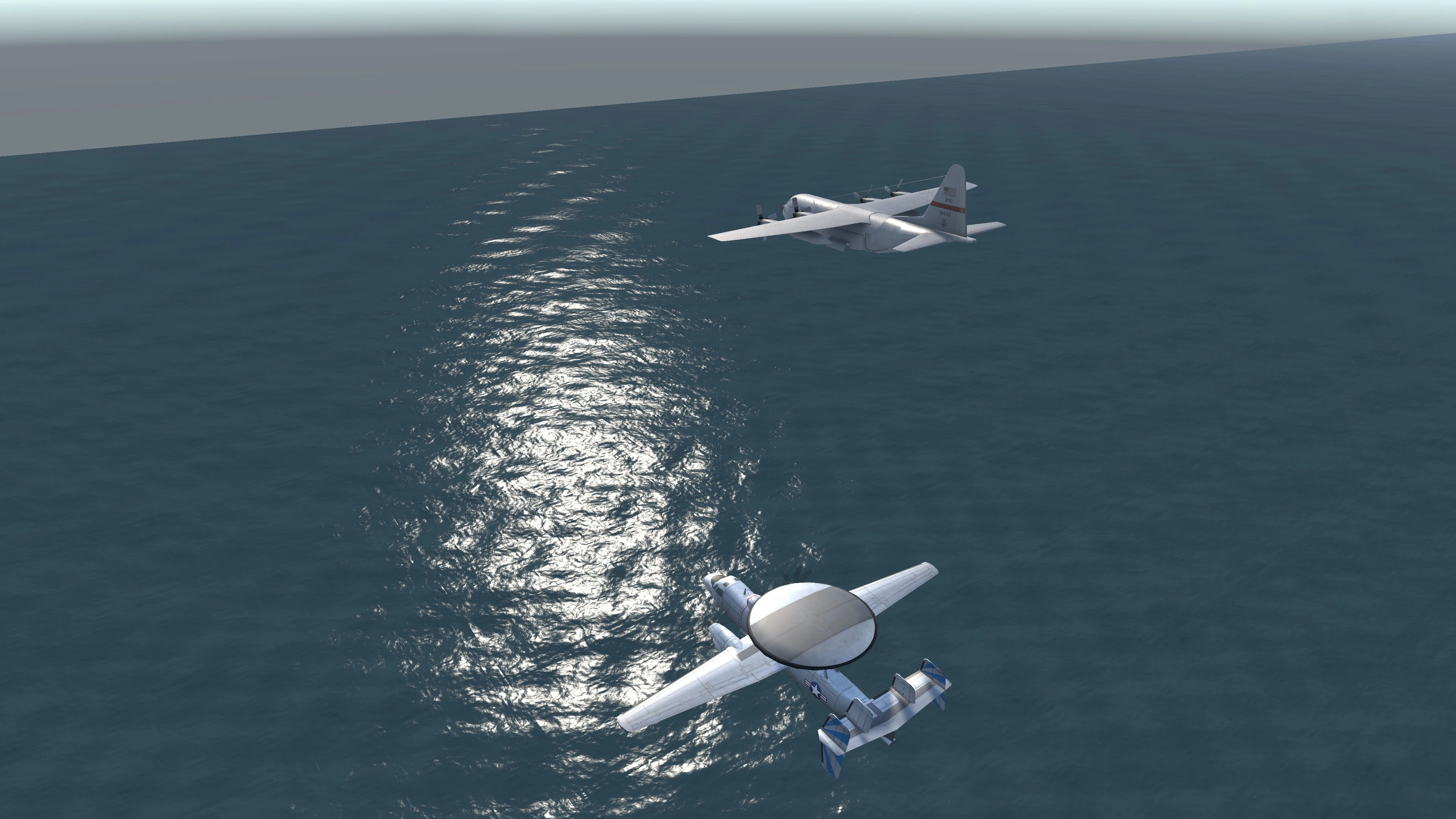 Two planes flying in formation over the sea